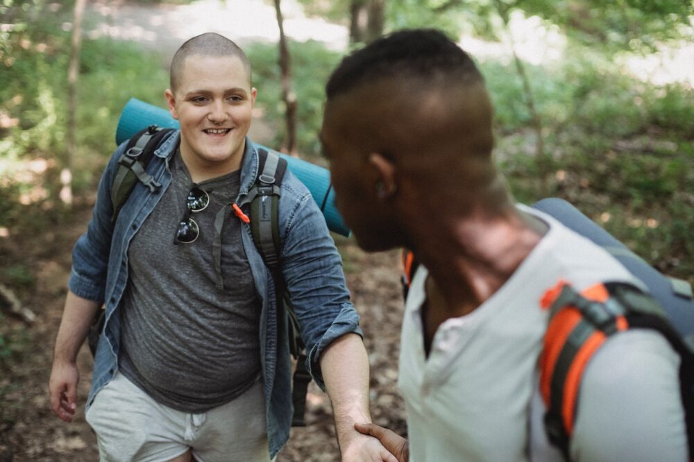 Two walkers helping each other